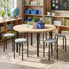Round stackable stools with removable washable covers, featuring heavy-duty metal legs, ideal for classrooms and dining areas.
