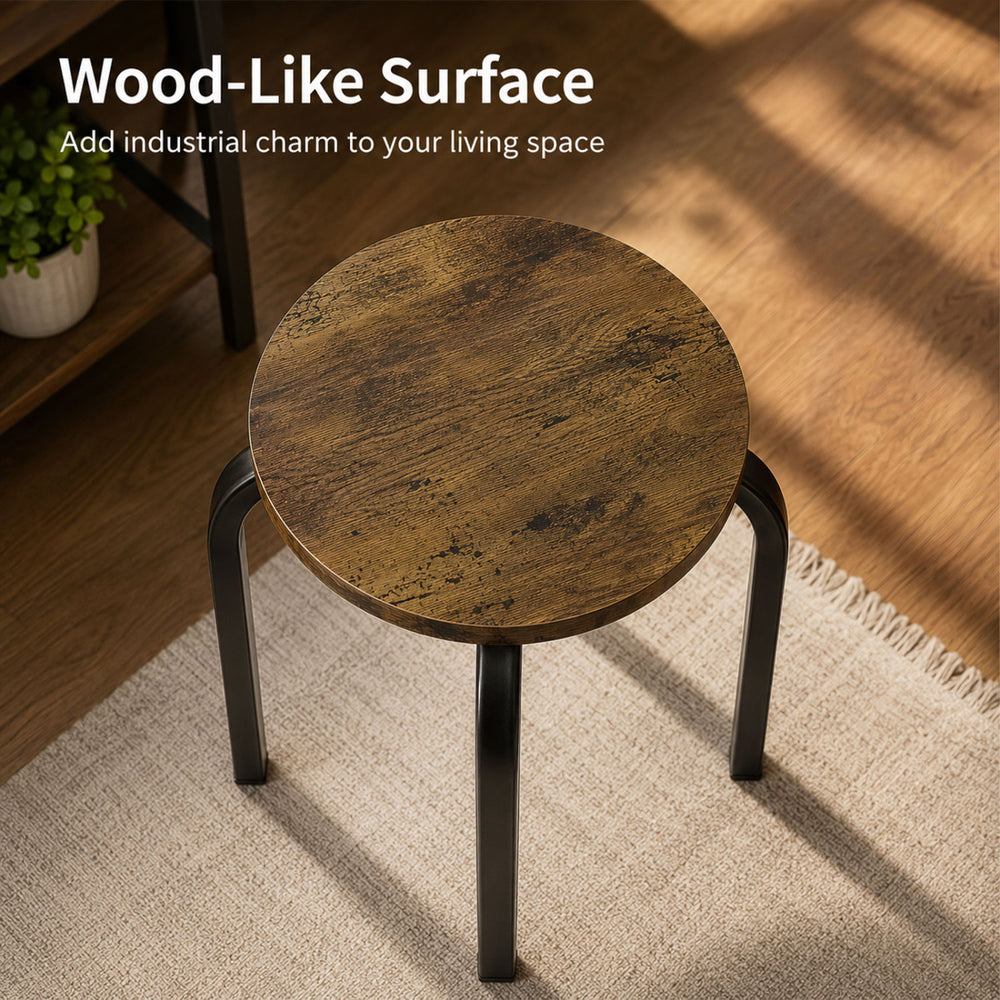 Round stackable stool with wood-like surface and heavy-duty metal legs, perfect for kitchen or dining room use.