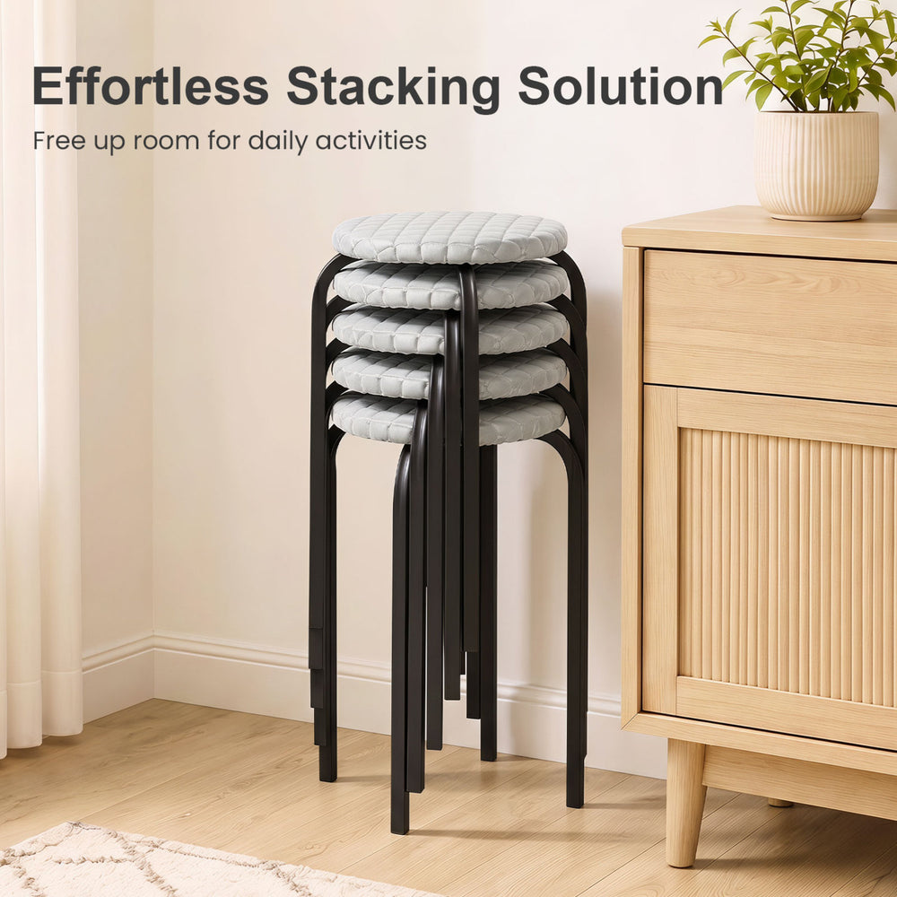 Round stackable stools with removable washable covers, featuring heavy-duty metal legs, ideal for kitchen or dining room use.