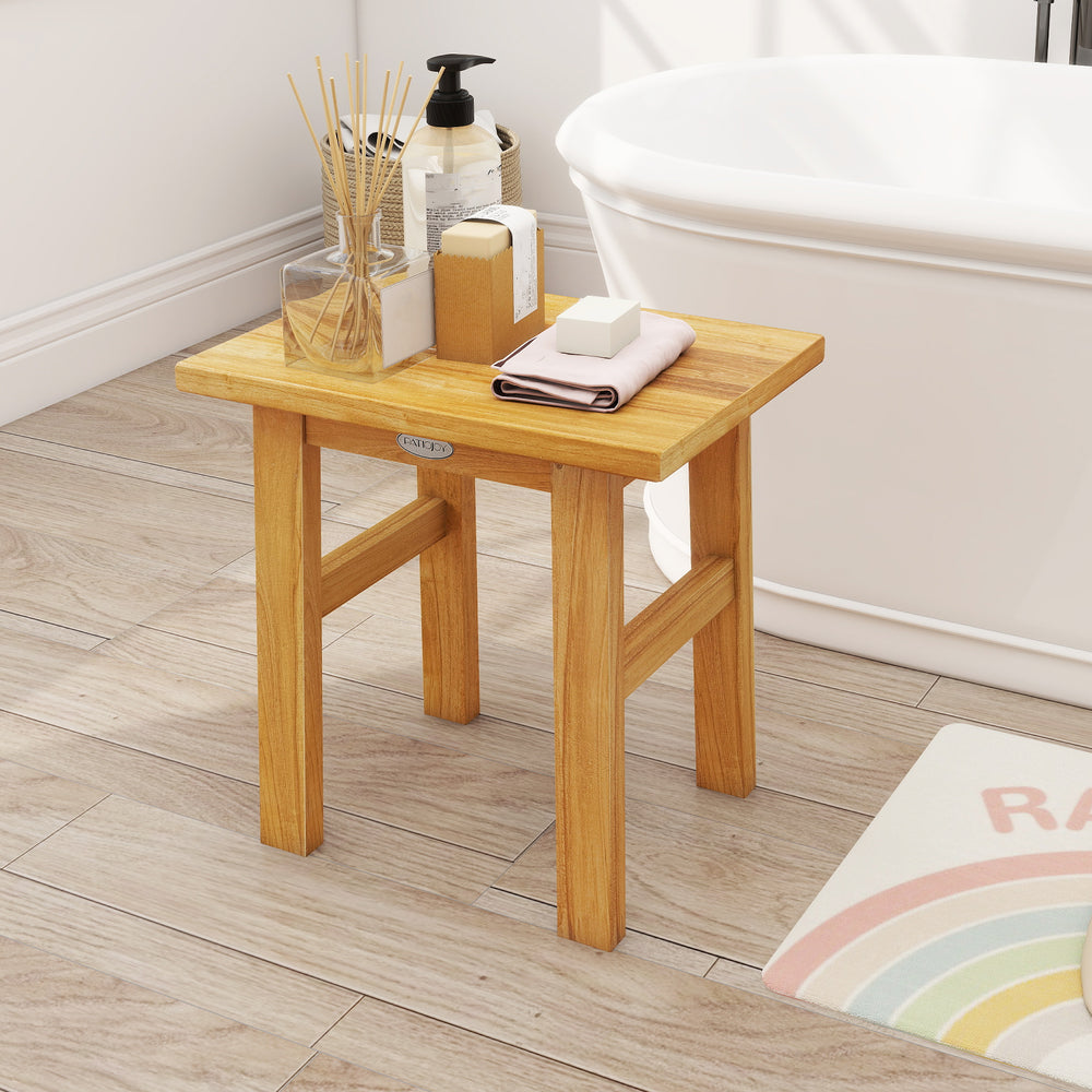 Teak shower bench with solid construction, compact design, ideal for shaving legs or as a side table in the bathroom.