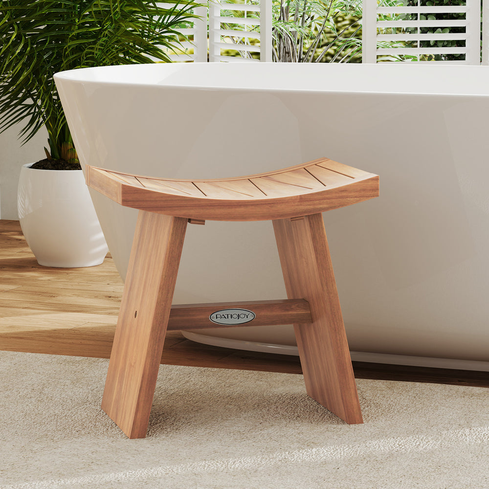 Teak wood shower bench with curved seat, featuring sturdy legs and drainage gap, ideal for bathroom use.