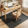 Interlocking black EVA foam floor tiles provide comfort and shock absorption, suitable for home gym or living room use.