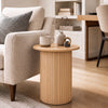 Fluted side table featuring a stylish round top and compact design, perfect for enhancing small spaces in any room.