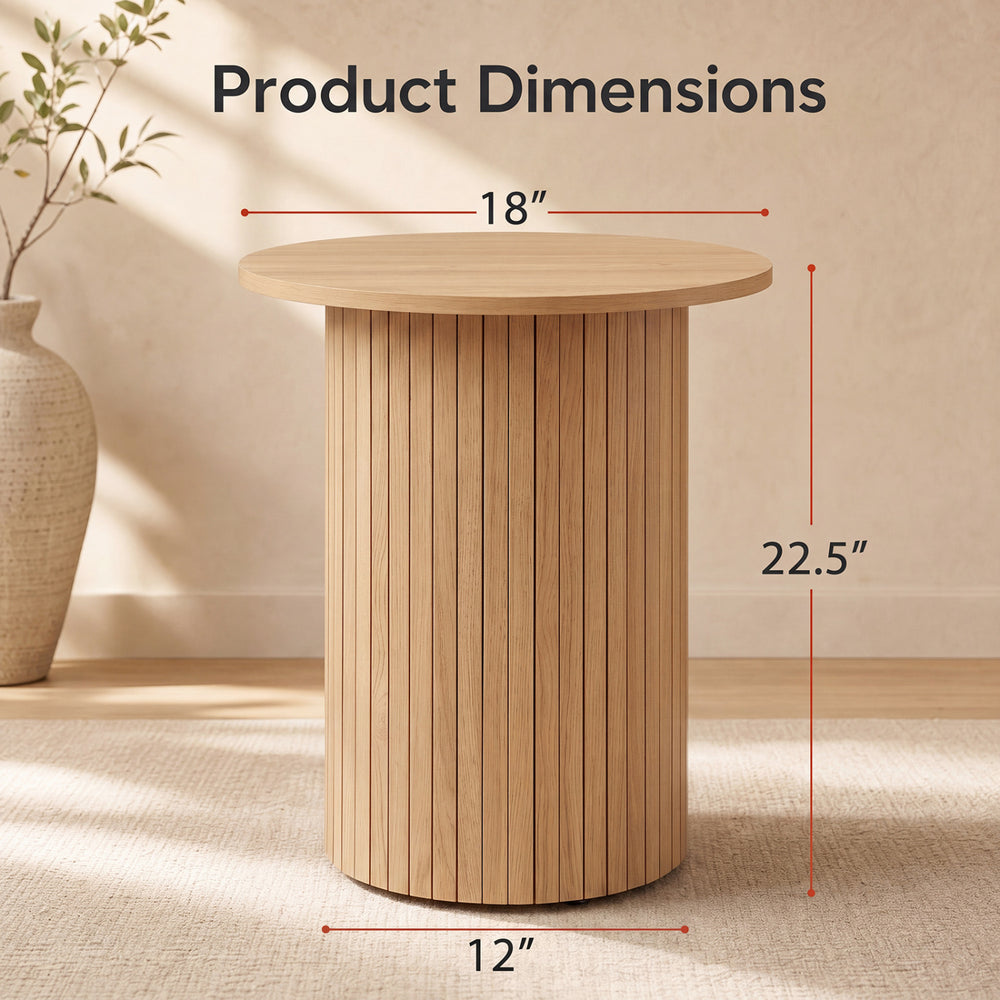 Round fluted side table with pedestal drum design, measuring 18" x 22.5", ideal for small spaces and stylish decor.