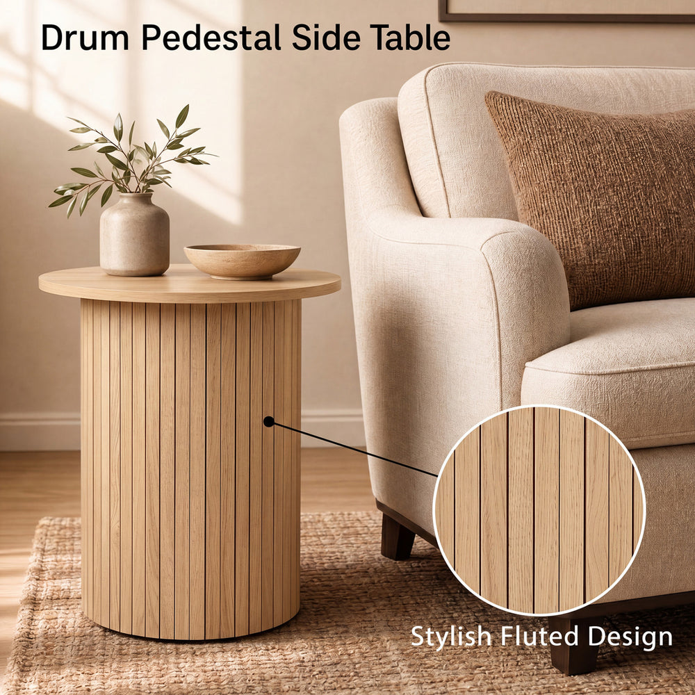 Round fluted side table with pedestal design, crafted from engineered wood, perfect for small spaces in any room.