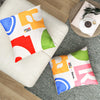 Vibrant 18 x 18 inch square throw pillow showcasing a colorful design, ideal for enhancing comfort and style in any.