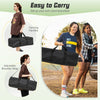 Portable outdoor volleyball net set with carrying handles and adjustable shoulder strap for easy transport and setup.