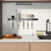 18-inch black magnetic tool holder strip with kitchen utensils, showcasing strong magnetic force for organized.