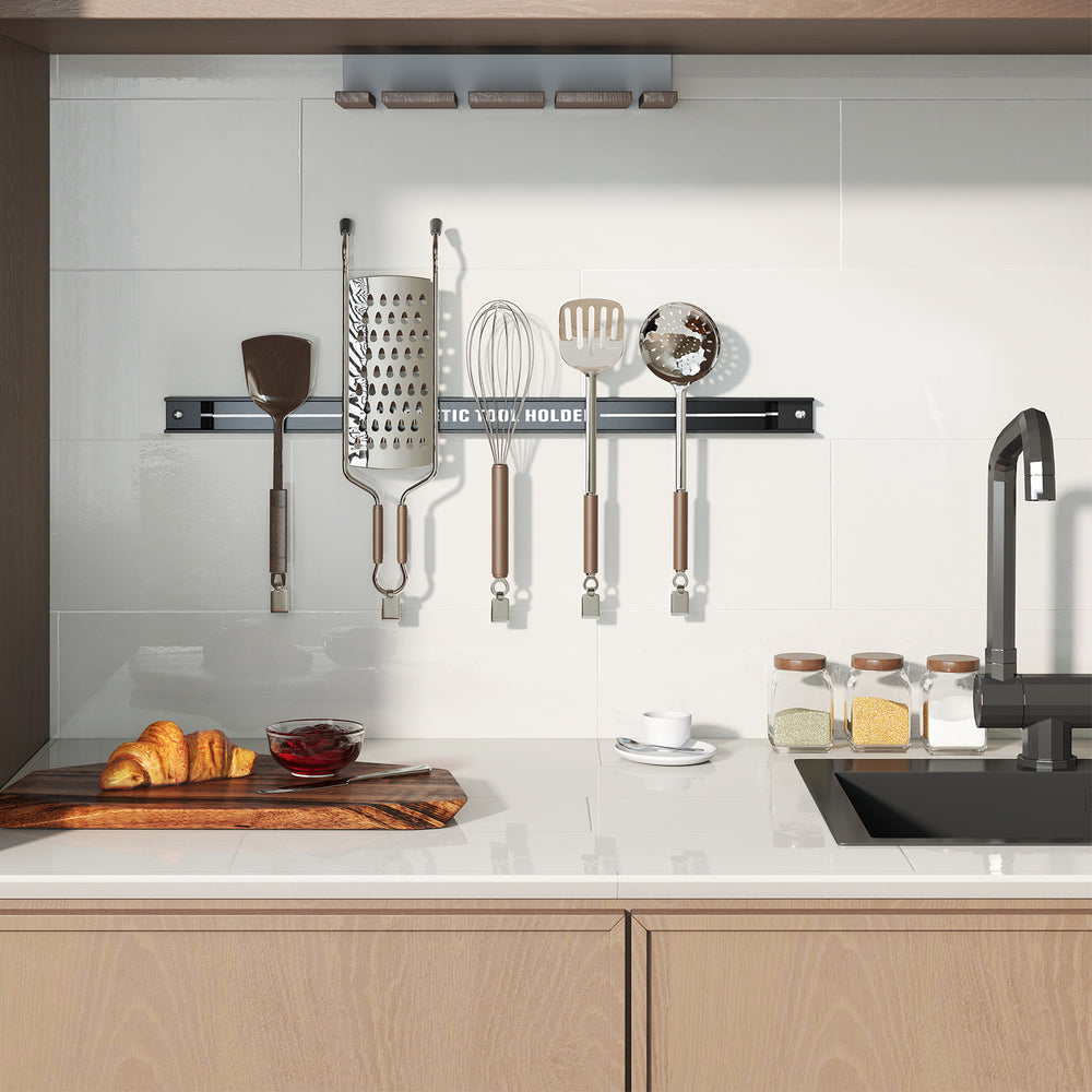 18-inch black magnetic tool holder strip with kitchen utensils, showcasing strong magnetic force for organized.