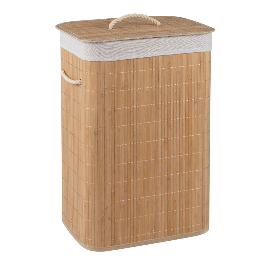 Bamboo clothes hamper with removable liner, top handle, and side handles for easy carrying in natural finish.