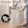 Bamboo clothes hamper with removable liner, portable handles, and natural texture for easy laundry organization.