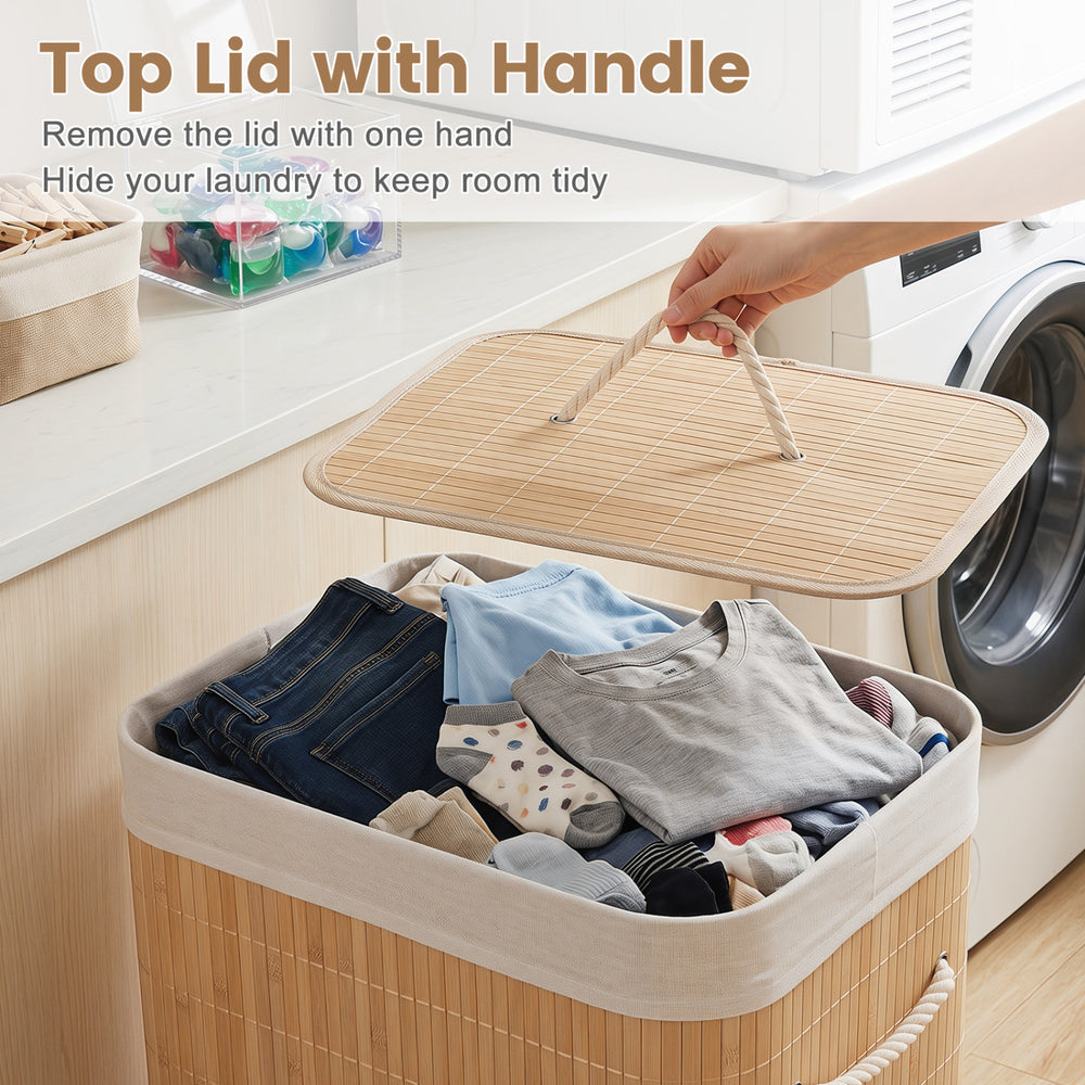 Bamboo clothes hamper with removable liner, top lid, and portable handles, ideal for laundry organization in any room.