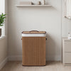 Bamboo clothes hamper with removable liner, 19-gal capacity, portable handles, ideal for bedrooms and laundry rooms.