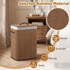 Bamboo clothes hamper with removable liner, 19-gal capacity, sturdy design, perfect for laundry room or bedroom use.