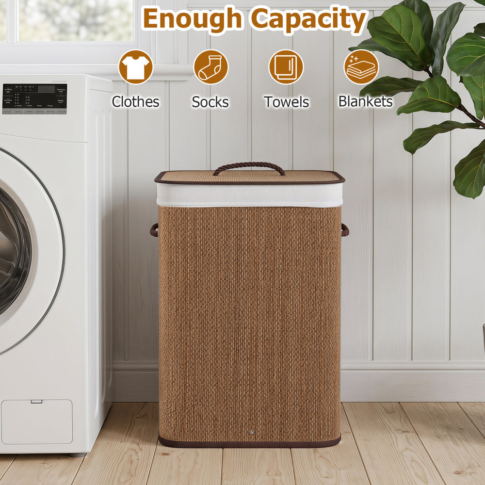 Bamboo clothes hamper with removable liner, 19-gal capacity, portable handles, ideal for laundry room storage.