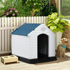 Durable plastic waterproof dog house with a blue roof, providing a safe outdoor shelter for pets. Easy to clean and.