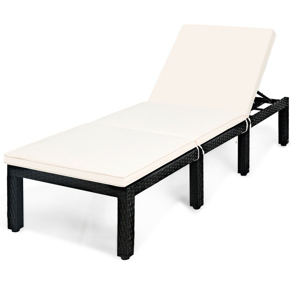 Height-adjustable patio rattan lounge chair with soft white cushion, perfect for poolside relaxation and outdoor decor.