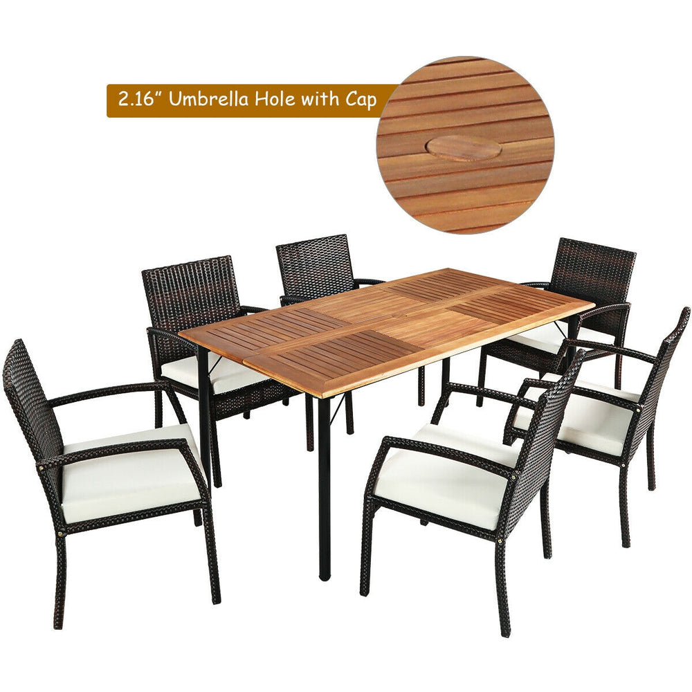 7-piece patio dining set featuring a spacious acacia wood table and 6 cushioned armchairs, perfect for outdoor use.