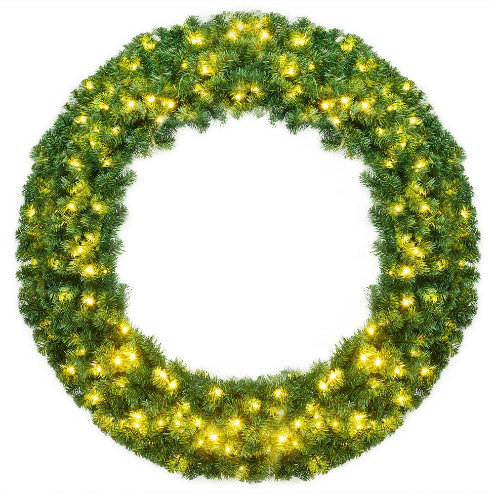48-inch pre-lit artificial Christmas wreath with 200 warm LED lights, featuring a lush green design for festive decor.