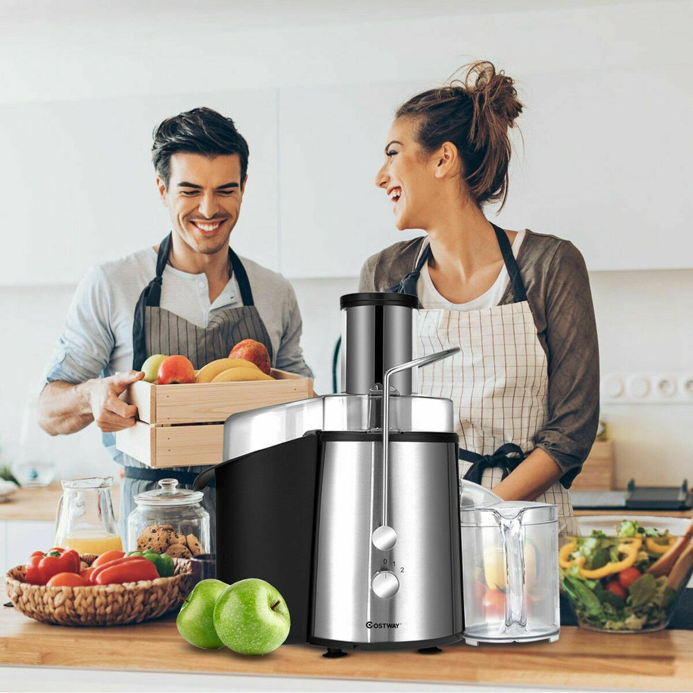Electric juice press with stainless steel design and 75mm wide feeder chute, ideal for whole fruits and vegetables.