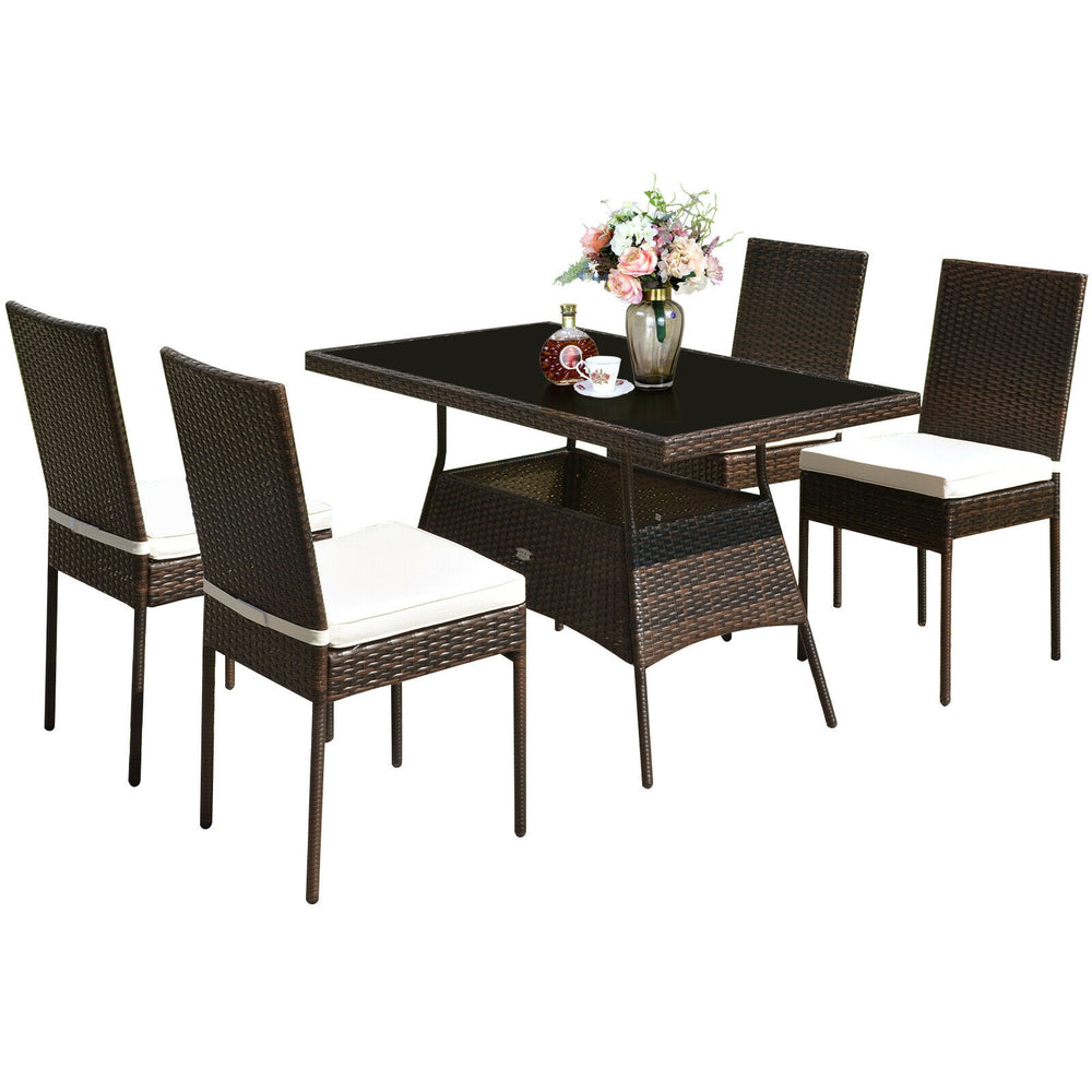 5-piece rattan dining set featuring a glass table and high back chairs, perfect for outdoor dining and relaxation.