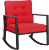 Red cushioned patio rattan rocking chair with sturdy metal frame, ideal for outdoor relaxation in garden or backyard.