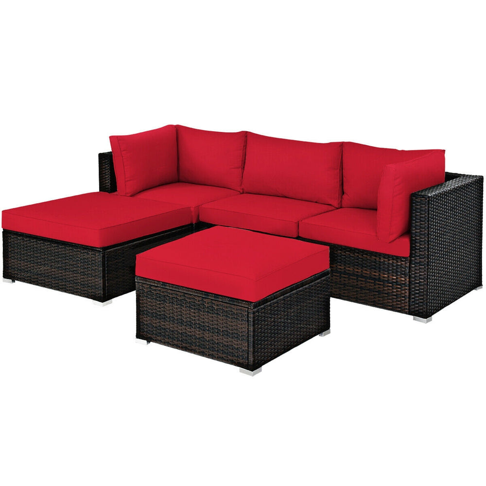 L-shaped 5-piece patio rattan sofa set with red cushions and ottoman, perfect for outdoor relaxation and versatile.