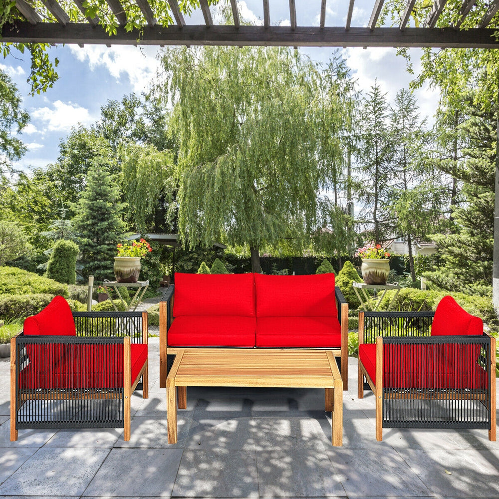 4-piece acacia wood outdoor patio furniture set with red cushions, ideal for relaxation in garden or poolside settings.
