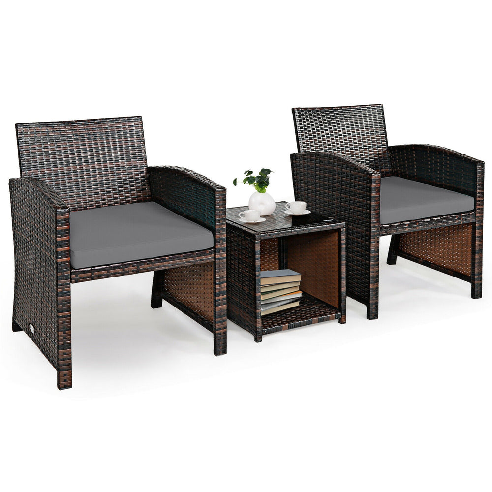Two PE rattan chairs with gray cushions and a coffee table, perfect for garden or patio relaxation.