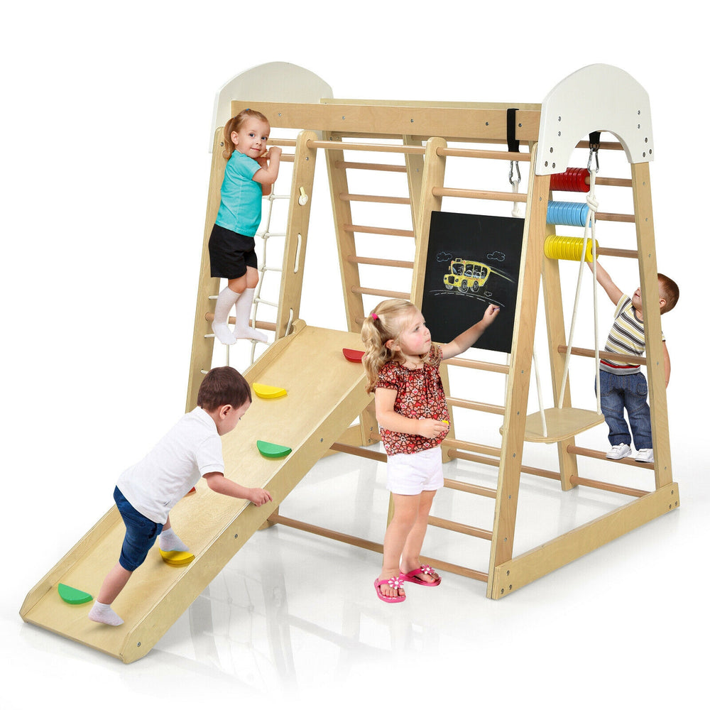 Wooden 8-in-1 indoor playground climbing gym with slide, climbing holds, and chalkboard for children’s active play.