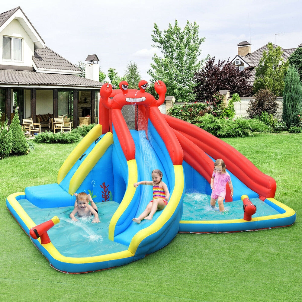 Inflatable water slide bounce house in crab theme with two slides, water cannons, and splash pools for kids' fun.