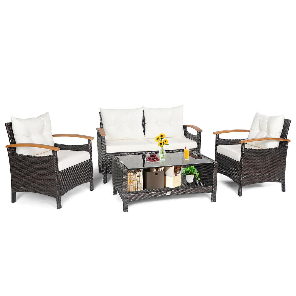 4-piece patio rattan furniture set with cushioned loveseat and chairs, featuring a storage coffee table for outdoor.