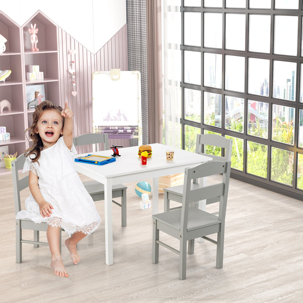Kids 5-piece table and chair set in white, perfect for playroom activities, featuring rounded corners for safety.