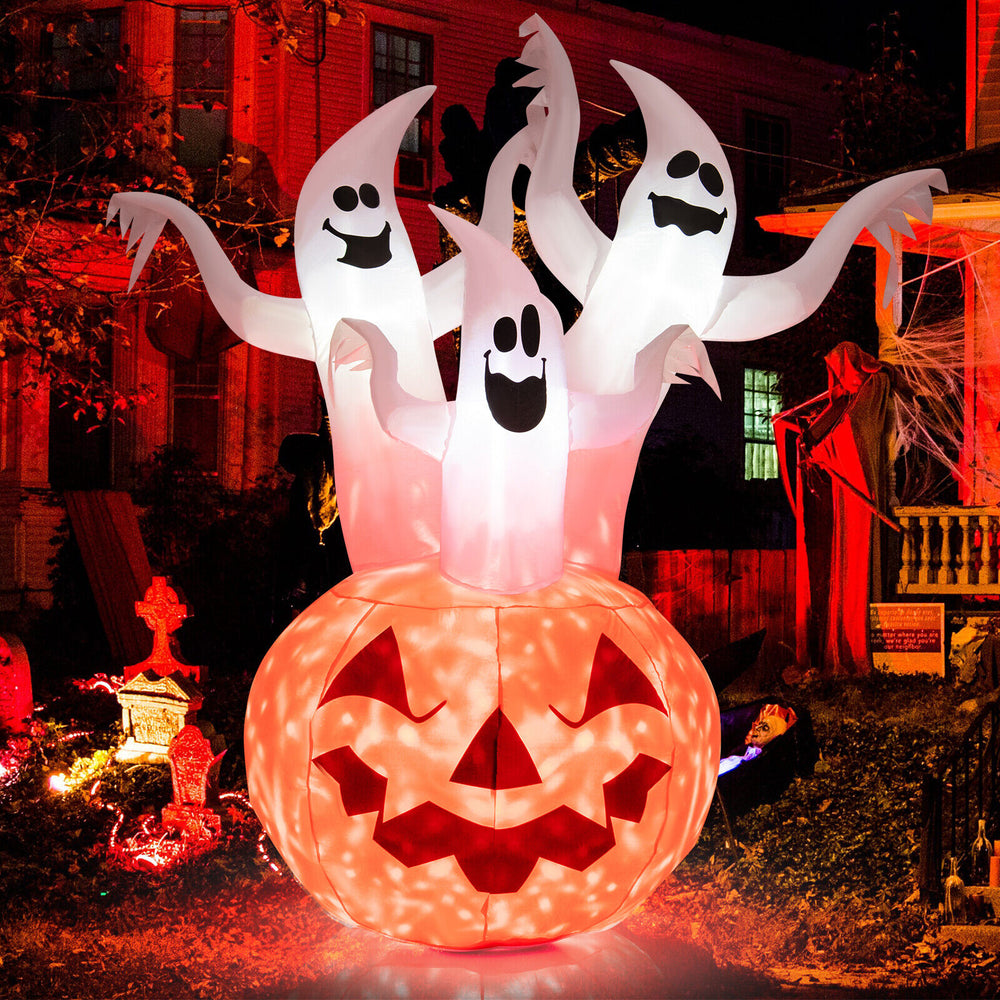 Inflatable Halloween decoration featuring 6-foot ghosts and a pumpkin, with a rotating lamp for a spooky atmosphere.