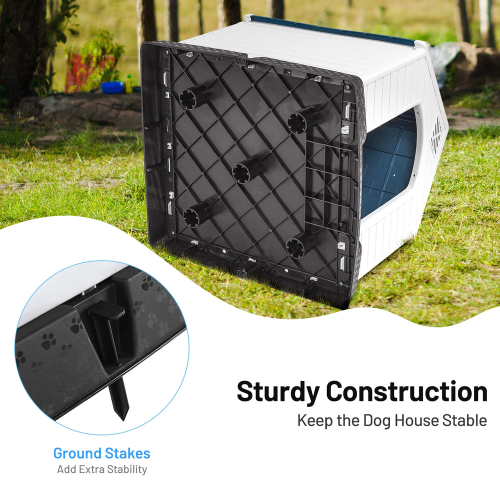 Sturdy plastic dog house with waterproof design and ground stakes for stability, ideal for outdoor pet shelter.