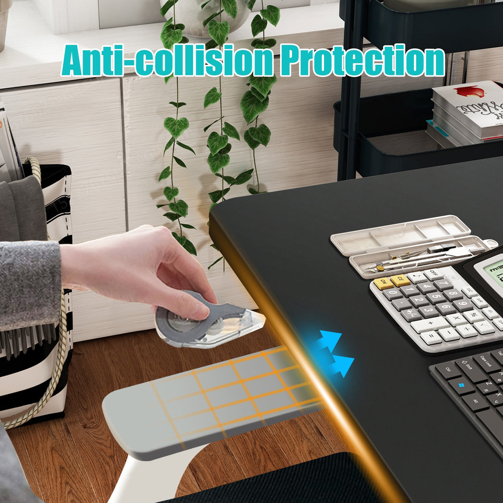 Electric height adjustable standing desk with anti-collision protection, featuring a spacious black tabletop and memory.