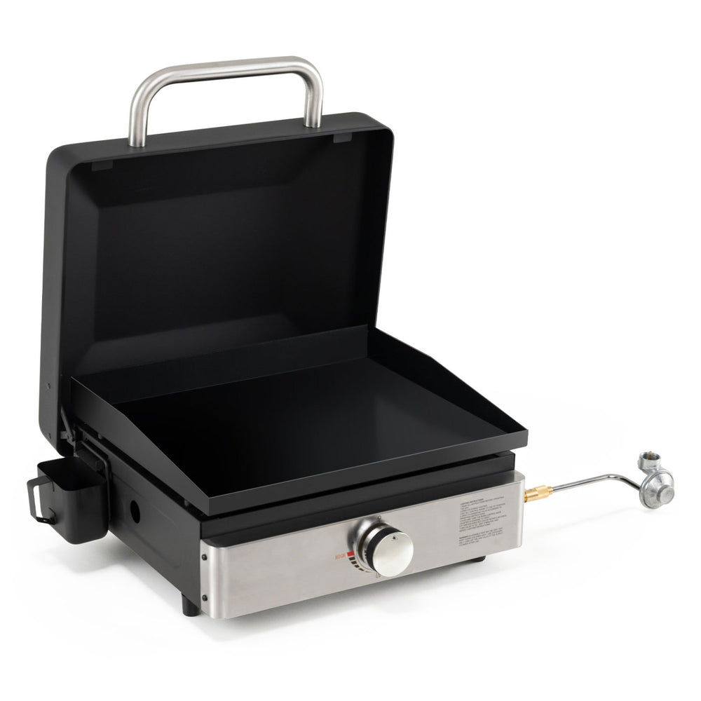 Portable gas griddle with a non-stick ceramic plate, high lid, and 12,500 BTU burner for outdoor cooking convenience.
