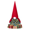Mini tabletop Christmas tree with Santa-inspired design, 20 warm white LED lights, and 105 frosted branch tips for festive decor.