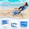 Foldable beach chair with adjustable backrest, padded pillow, and storage pockets, perfect for outdoor relaxation.