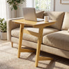 C-shaped wood side table with a veneered top, perfect for laptops and snacks, fits snugly beside a couch.