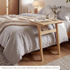 C-shaped wood side table with a solid rubber wood frame, perfect for bedside use or as a snack table.