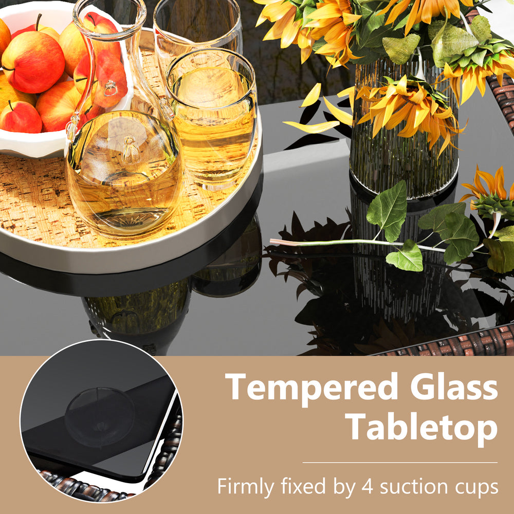 Tempered glass tabletop secured with 4 suction cups on a wicker coffee table, ideal for outdoor relaxation.