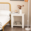 Compact white 2-tier end table with storage shelf, ideal for small spaces in living room or bedroom.