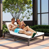 Two-person patio rattan lounge chair with adjustable backrest, featuring soft cushions and sturdy steel construction.