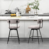 Modern upholstered bar stools with back and footrests in beige, featuring metal legs, ideal for kitchen islands.