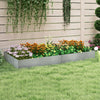 Galvanized metal landscape edging forming a flower bed border, ideal for maintaining neat garden areas.