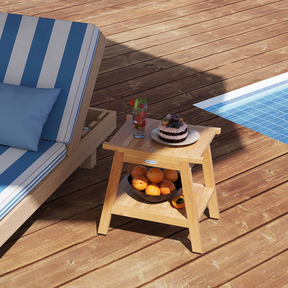 Teak wood shower bench with storage shelf, slatted design, and adjustable foot pads for stability by the poolside.