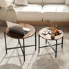 Rustic brown round coffee table set of 2 with metal frame, ideal for individual use or nesting to save space.