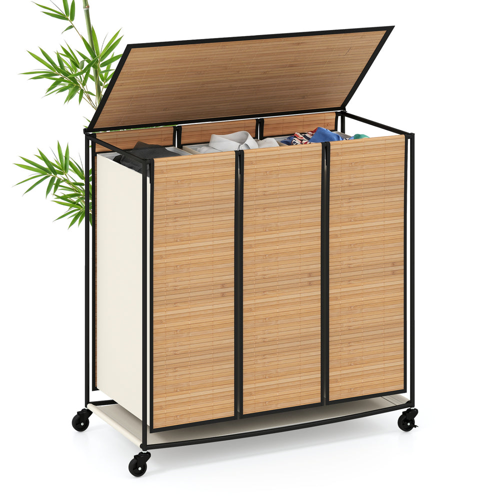 Three-section laundry hamper with bamboo slats and lid, featuring removable liners and lockable wheels for easy transport.