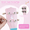 Close-up of the pink 21-inch children's ukulele headstock with guitar-style tuning pegs for easy string adjustments.